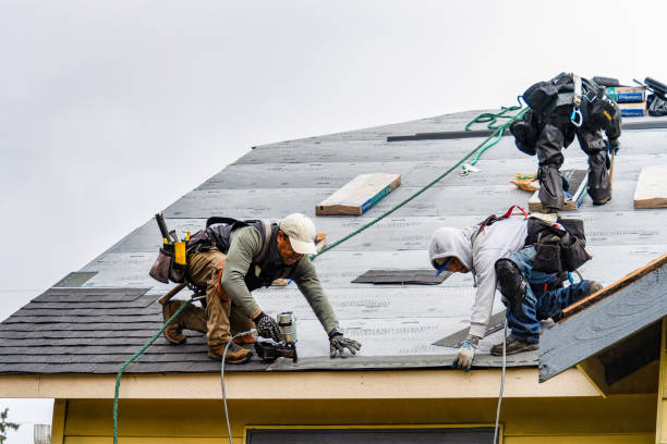 Professional Roofing technician working in New Castle, NH
